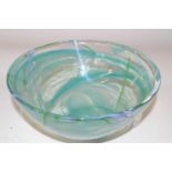 A Kosta Boda glass bowl with a green streak design, 22cm diameter