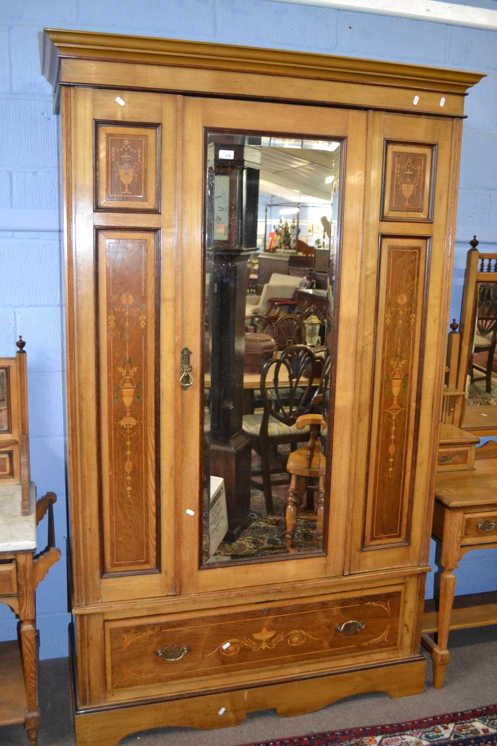 A Victorian ash and inlaid bedroom suite comprising a mirrored door wardrobe, a dressing table - Image 3 of 4