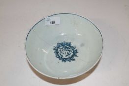 An English porcelain 18th Century slop bowl with painted floral design, the interior with a