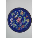 A small enamelled bowl, the blue ground with famille rose decoration, 17cm diameter (Inventory 351)