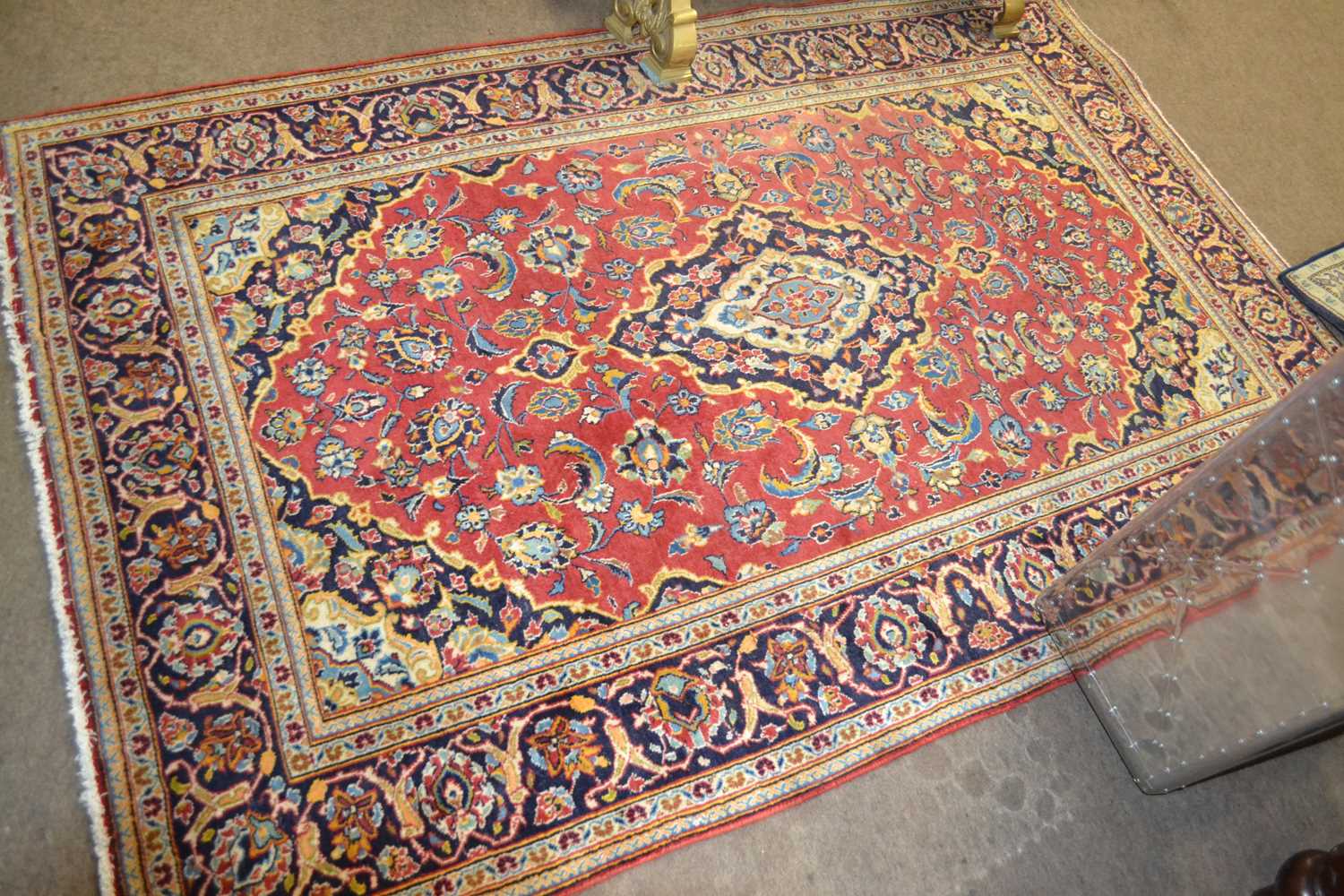 A contemporary Kashan rug with central red panel, 2.12 x 1.4 metres
