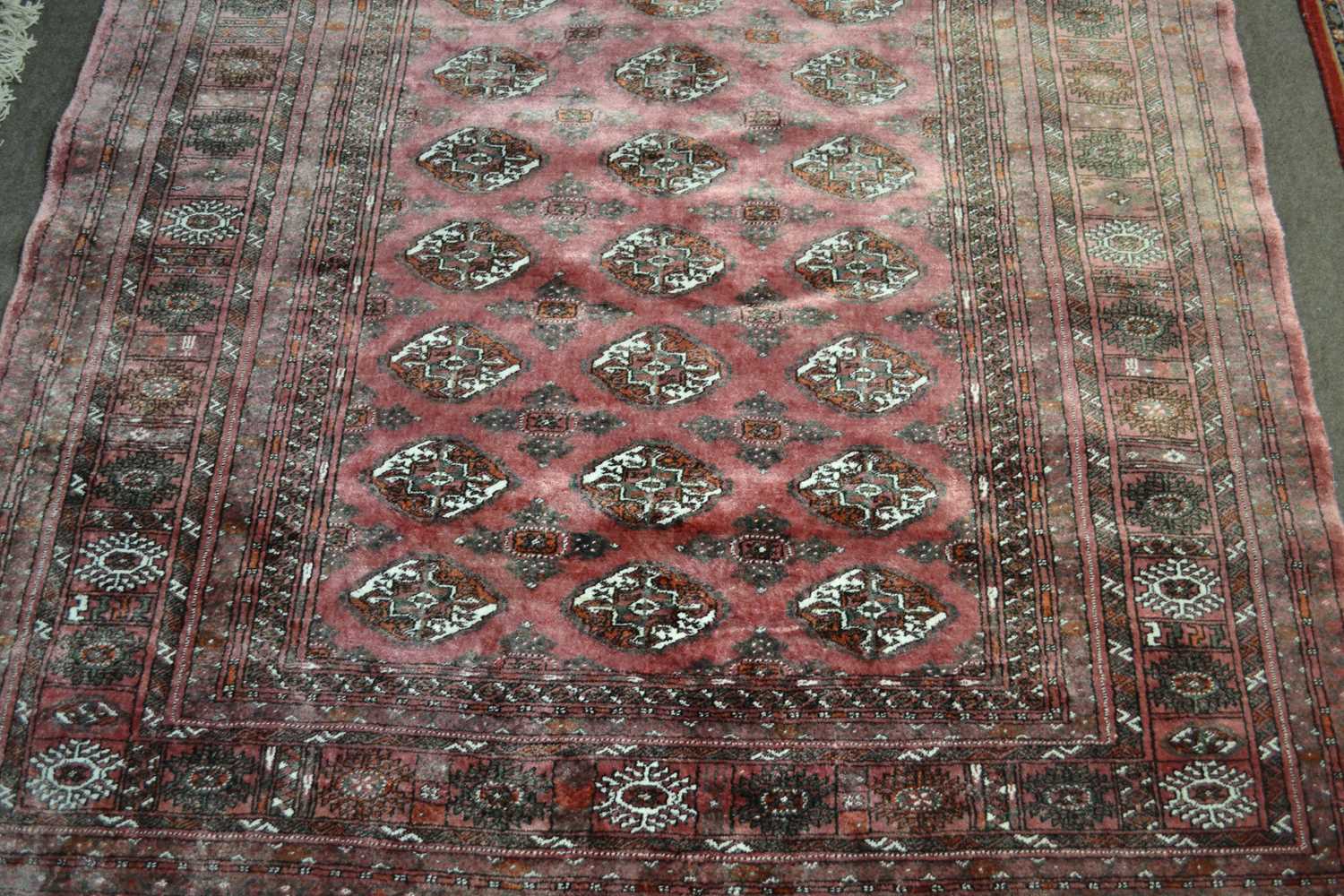 A 20th Century silk mix Bokhara type floor rug, 190 x 135cm - Image 2 of 2