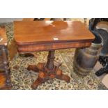 A Victorian mahogany pedestal tea table with platform base and scrolled feet, 81cm wide