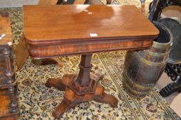 A Victorian mahogany pedestal tea table with platform base and scrolled feet, 81cm wide