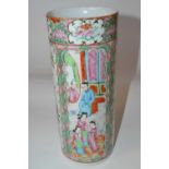 A late 19th Century Cantonese porcelain cylindrical vase, decorated in typical fashion with panels