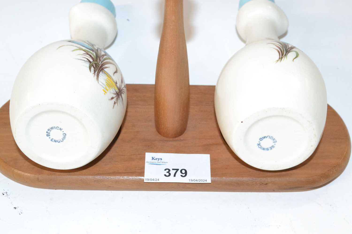 A Beswick pair of vinegar bottles on wooden stand by Beswick with floral decoration - Image 2 of 2