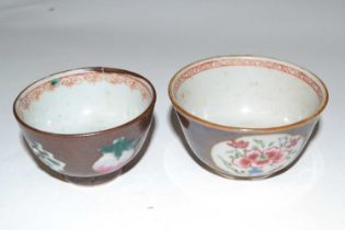 A pair of Chinese Batavia tea bowls, probably 18th Century, the cafe au lait ground with famille