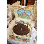 A vintage Decca portable gramophone, the case decorated with various nursery rhyme scenes