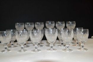A suite of Waterford glasses including six wine glasses, six cordial glasses and a further six, some