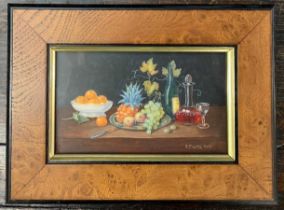 Enid Clarke RMS (British, 1919-2020), Fruit and Wine, oil on board, 6x10.5cm, framed. Tudor