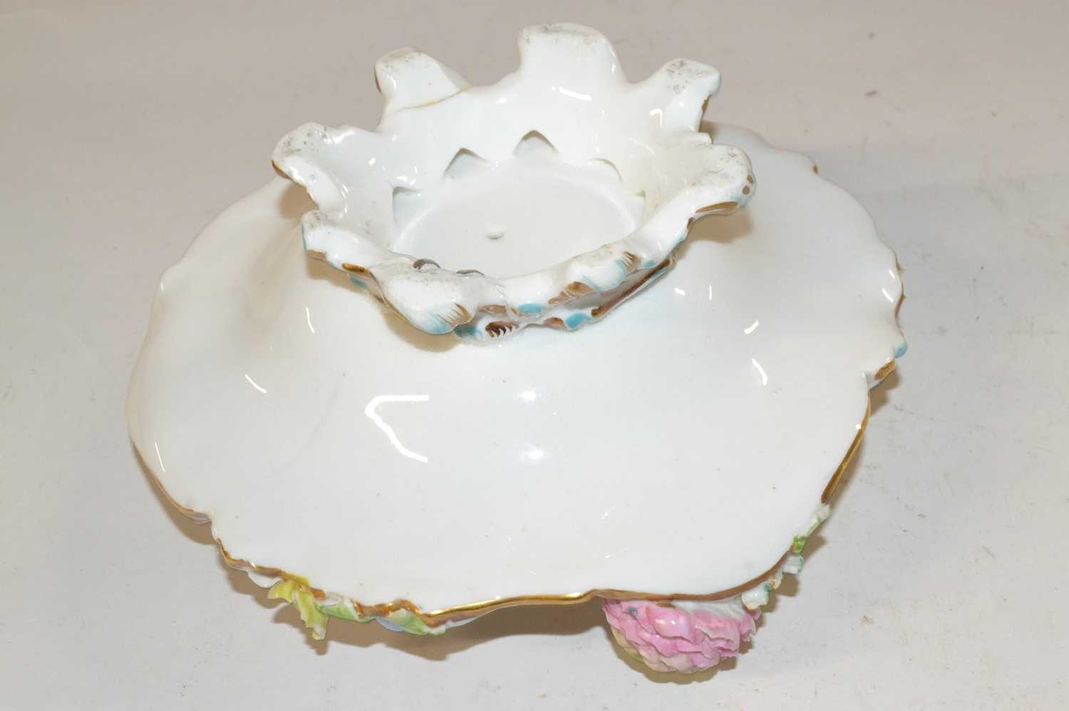 A 19th Century porcelain candle holder painted with floral sprays and flowers in relief - Image 3 of 3