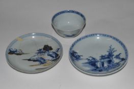 A Chinese porcelain tea bowl and saucer from the Nanking Cargo sale with Christies sticker to saucer