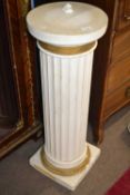 A composition jardiniere stand of ribbed circular form, 92cm high