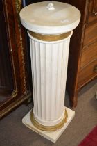 A composition jardiniere stand of ribbed circular form, 92cm high
