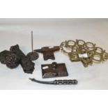 Mixed group of metal wares comprising a pierced brass trivet, a Victorian iron door knocker, a