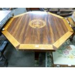 An unusual 19th Century octagonal centre table with inlaid armorial to centre, surrounded by