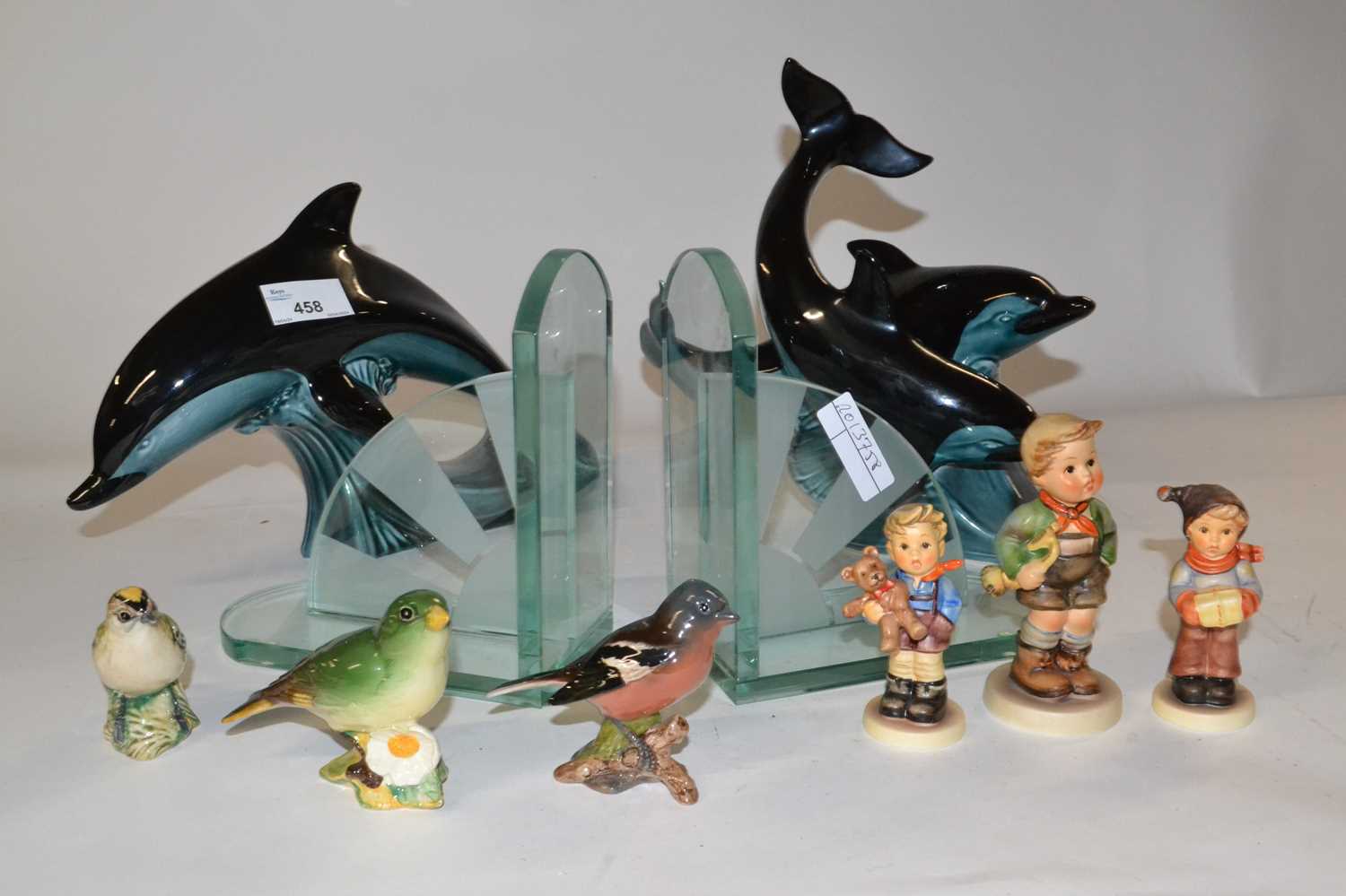 A pair of glass Art Deco style book ends, two Poole pottery models of dolphins and a quantity of - Image 2 of 2