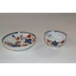 A Lowestoft porcelain tea bowl and saucer decorated in Redgrave style with the two bird pattern