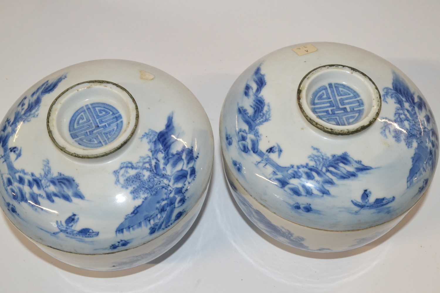 Two Oriental porcelain bowls and covers with blue and white designs, the covers with good luck - Image 2 of 5