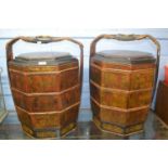 A pair of Chinese octagonal stacking food containers with lacquered decoration depicting various