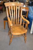 Victorian elm and ash windsor chair of traditional shape with turned legs.