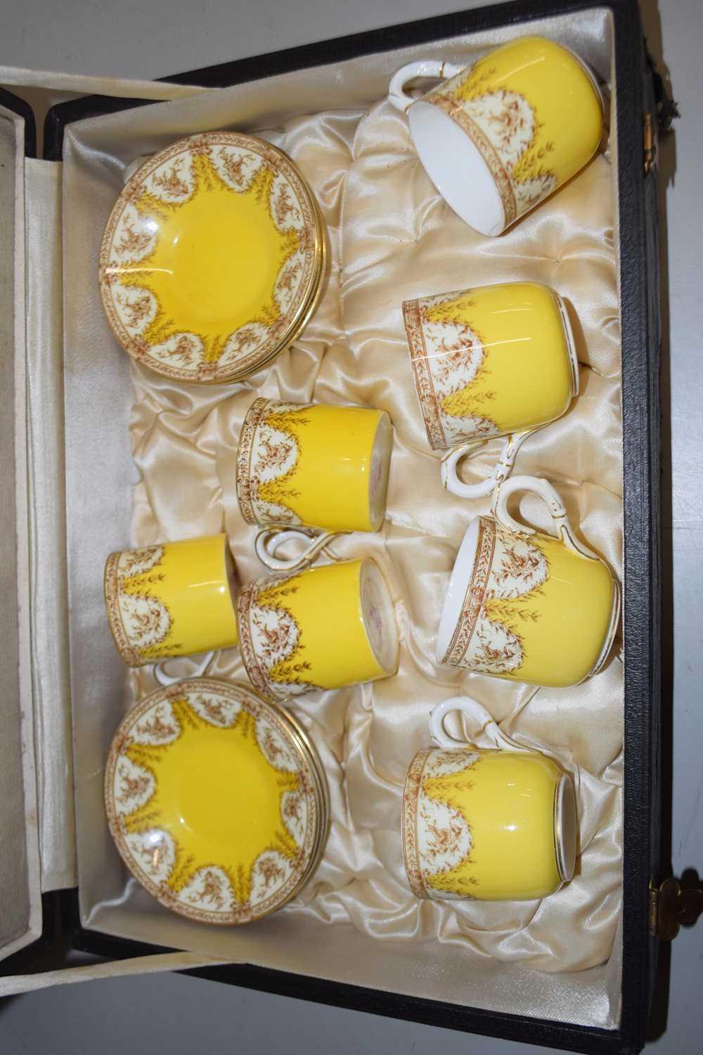 A cased Royal Worcester coffee set, the yellow ground with floral decoration comprising four cups - Image 5 of 6
