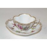 A 19th Century Dresden cup and saucer of quatre lobe form decorated with flowers, blue AR mark to