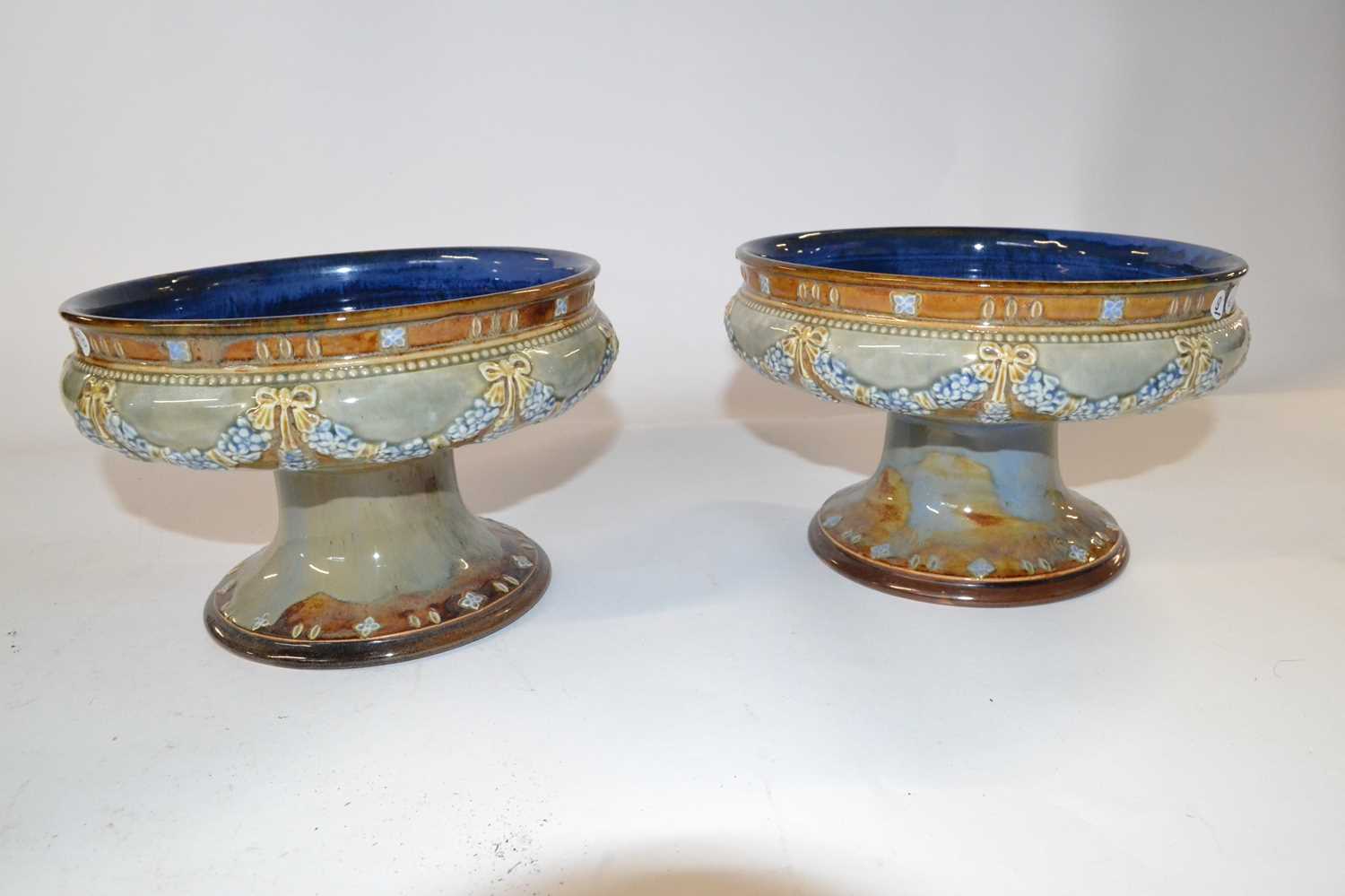 A pair of Royal Doulton tazzae, both with applied floral design of swags, 19cm diameters - Image 2 of 4