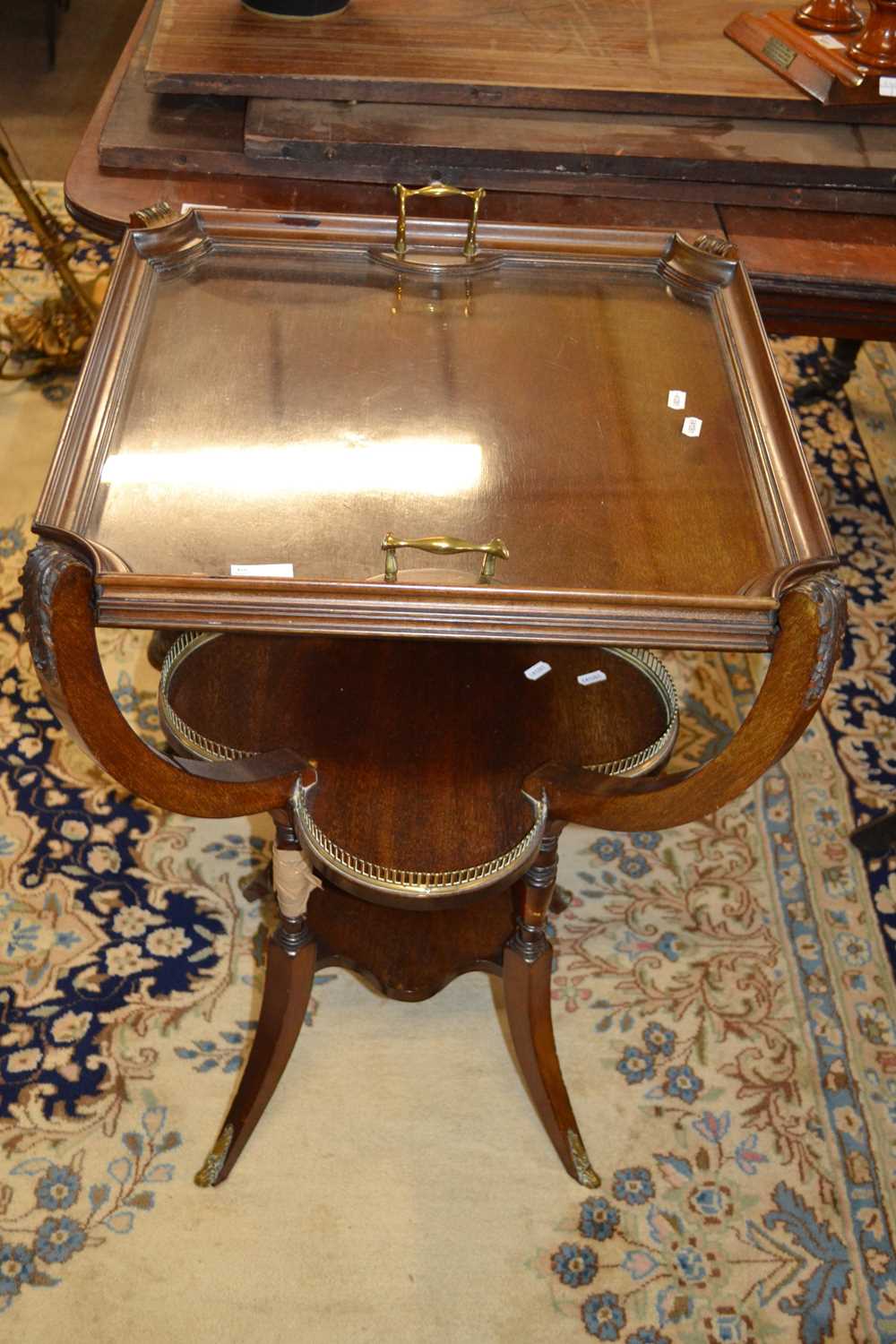 An early 20th Century continental tray top side table with lift off glass bottomed tray supported on