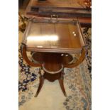 An early 20th Century continental tray top side table with lift off glass bottomed tray supported on