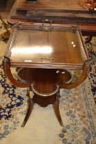 An early 20th Century continental tray top side table with lift off glass bottomed tray supported on