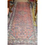 Mid 20th Century Iranian wool runner carpet with three large medallions to centre in pink, red, blue
