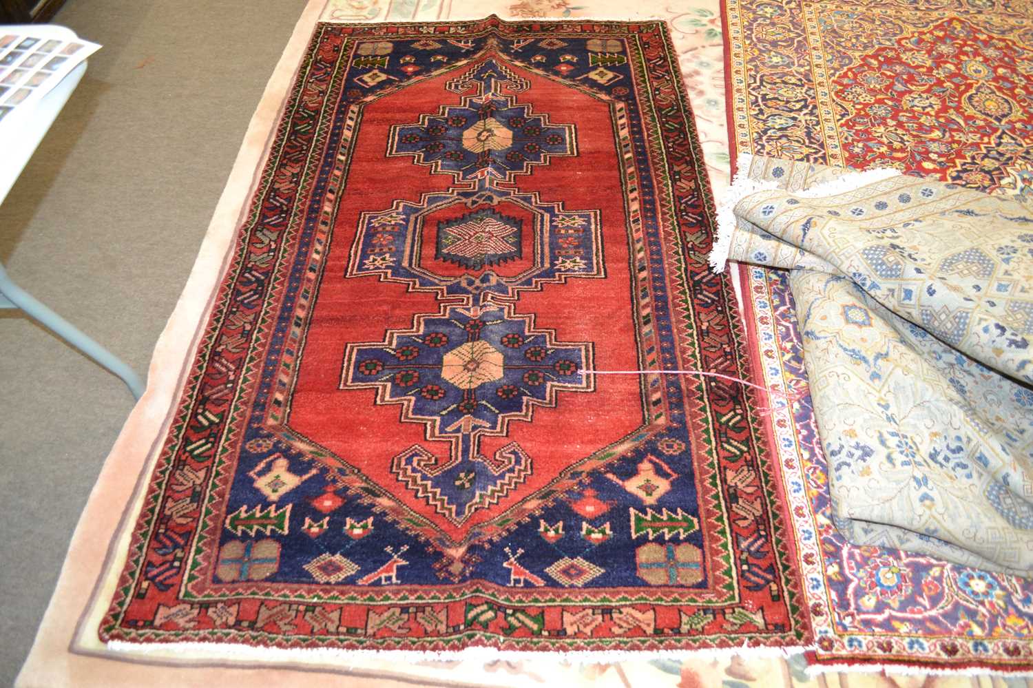 Modern Iranian Hamadan wool rug decorated with a large central red panel, 204 x 140cm