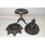 Mixed Lot: A Victorian cast iron spitoon together with a further circular tripod base trivet and a