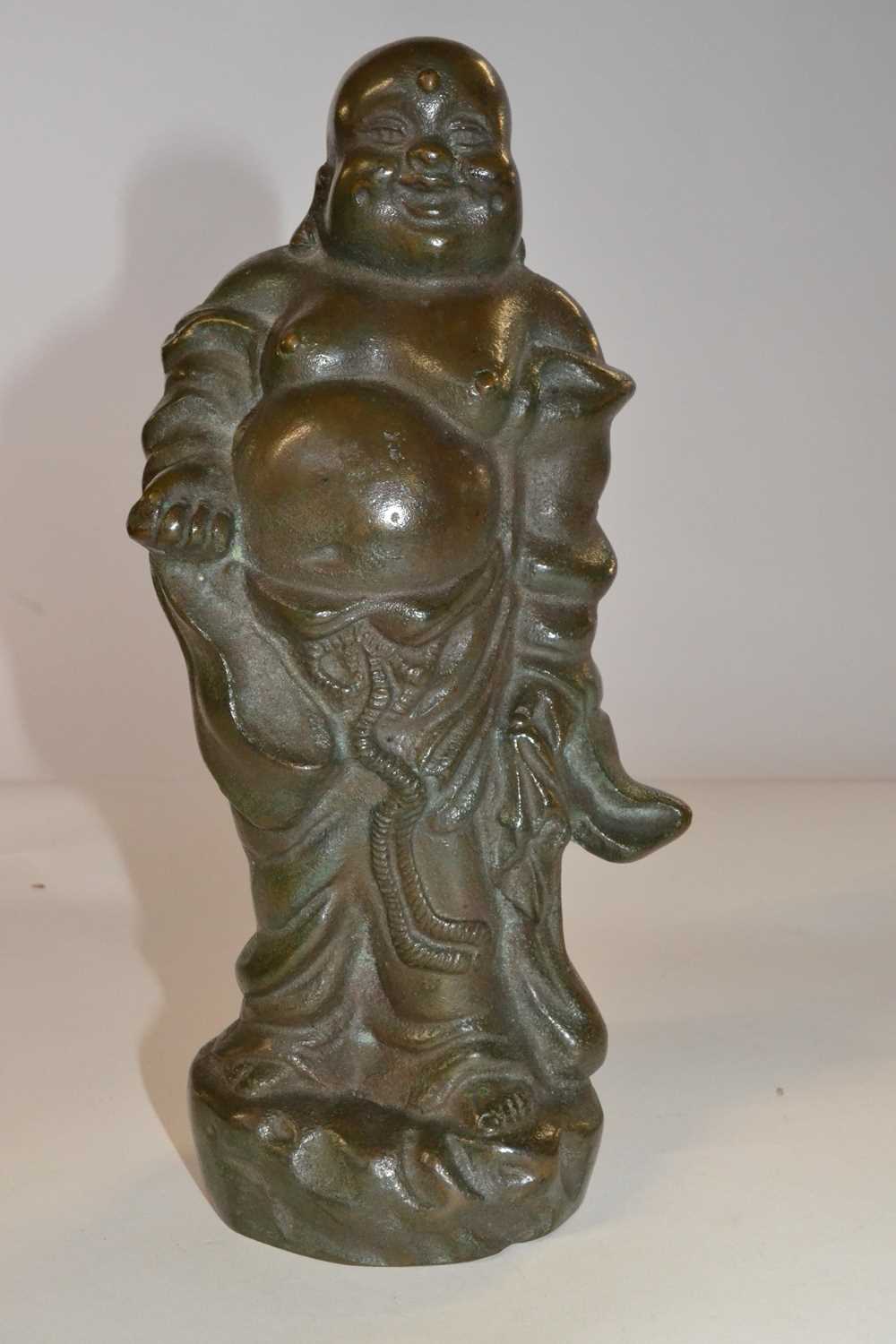 A Chinese bronze figure of an immortal, 24cm high