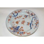 An 18th Century Chinese porcelain charger, Qianlong period, decorated in Imari style (broken and