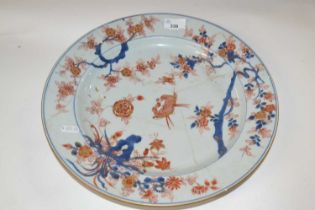 An 18th Century Chinese porcelain charger, Qianlong period, decorated in Imari style (broken and