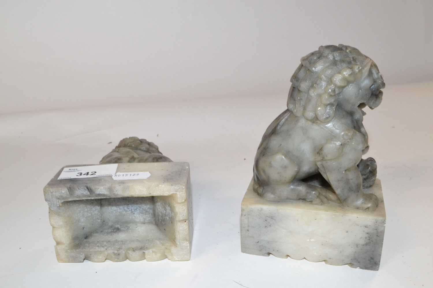 A pair of Oriental soapstone lions on rectangular bases, 15cm high - Image 2 of 2