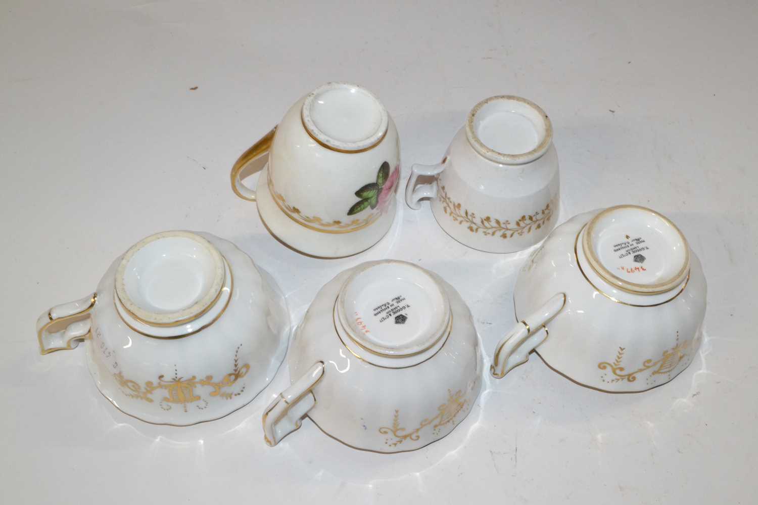 Group of five English porcelain cups, all painted with roses in Coalport style, some with retailer - Image 2 of 2