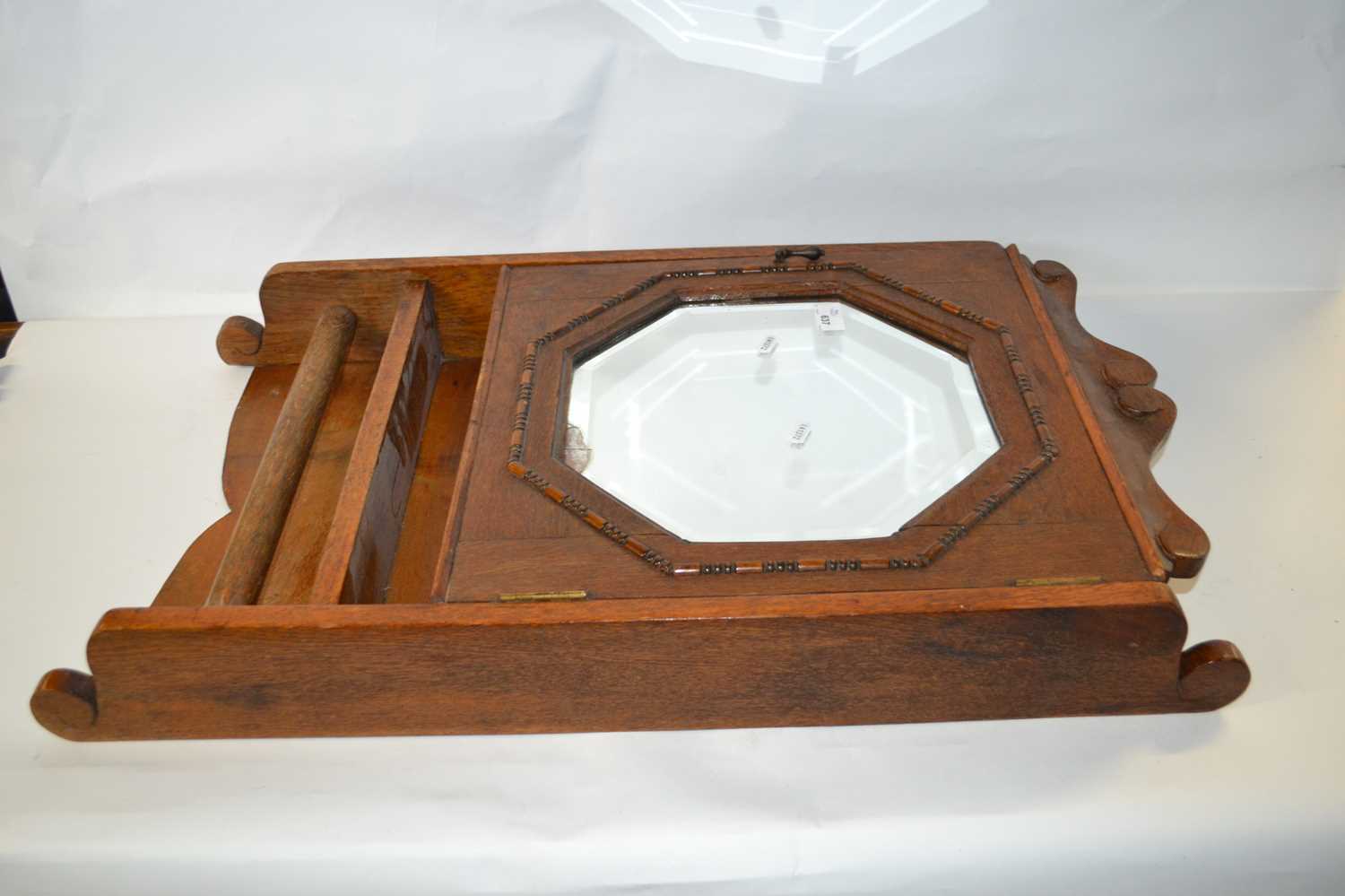 Early 20th Century oak wall cabinet with mirrored door and integral towel rail, 95cm high