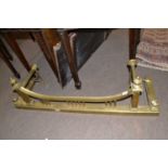 19th Century brass fire fender with dipped front rail, 120cm wide