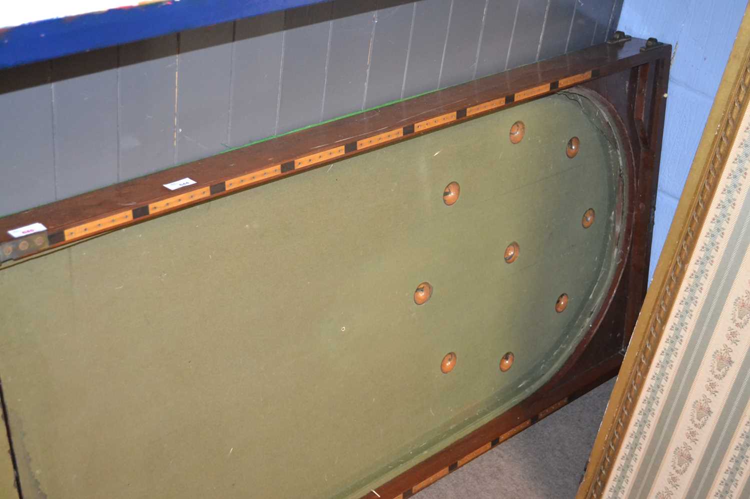 A folding Victorian mahogany cased bar billiards game