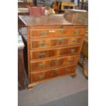 An unusual Georgian yew secretaire chest with fitted secretaire drawer with drop down front