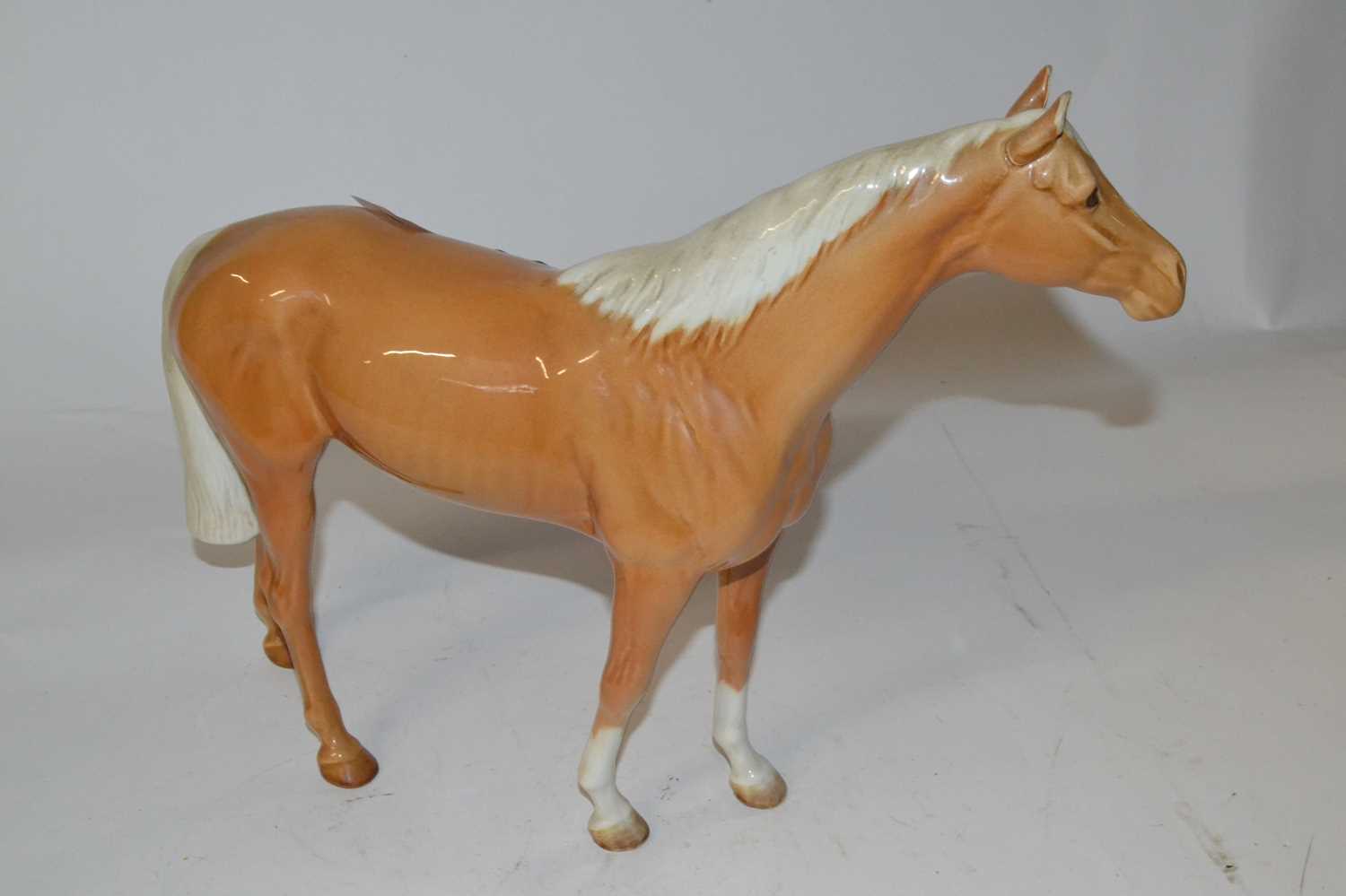 A Beswick model of a Palomino mare in a gloss finish by Arthur Gredington (1961-1983)