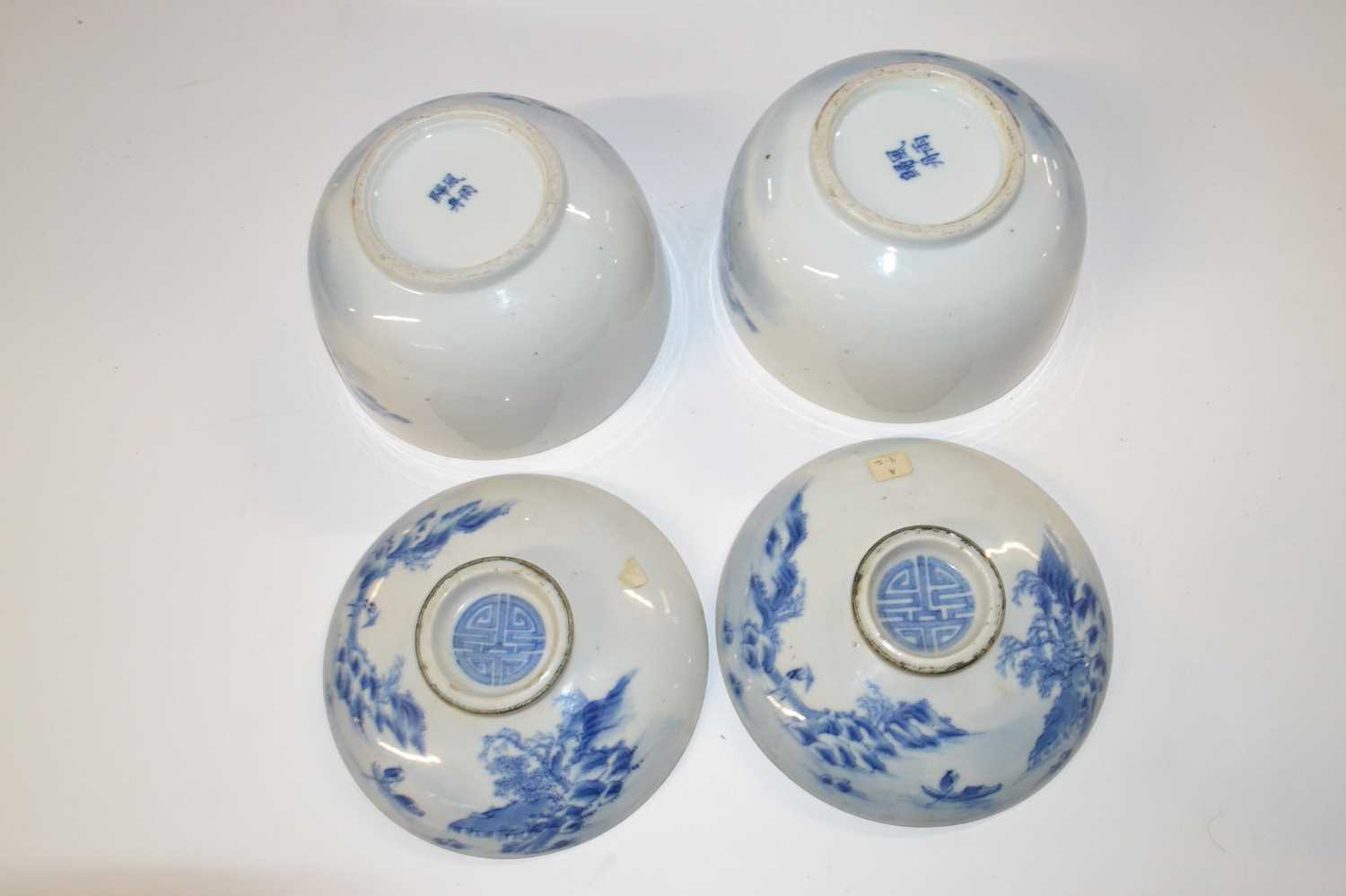 Two Oriental porcelain bowls and covers with blue and white designs, the covers with good luck - Image 4 of 5