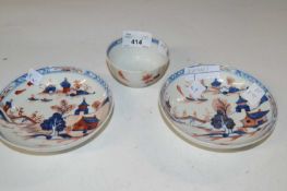 A Lowestoft porcelain tea bowl and saucer in the Dolls House pattern together with a further