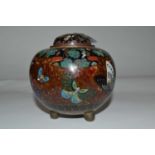 A Cloisonne bowl and cover, the bowl raise on three stub feet decorated with butterflies, the