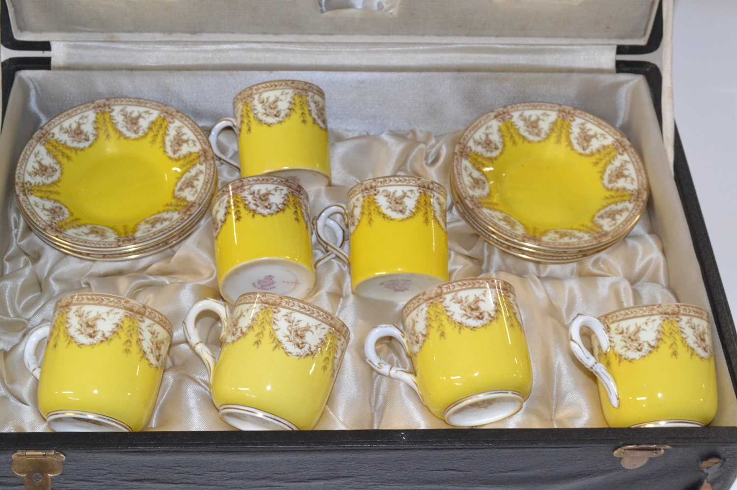 A cased Royal Worcester coffee set, the yellow ground with floral decoration comprising four cups - Image 6 of 6