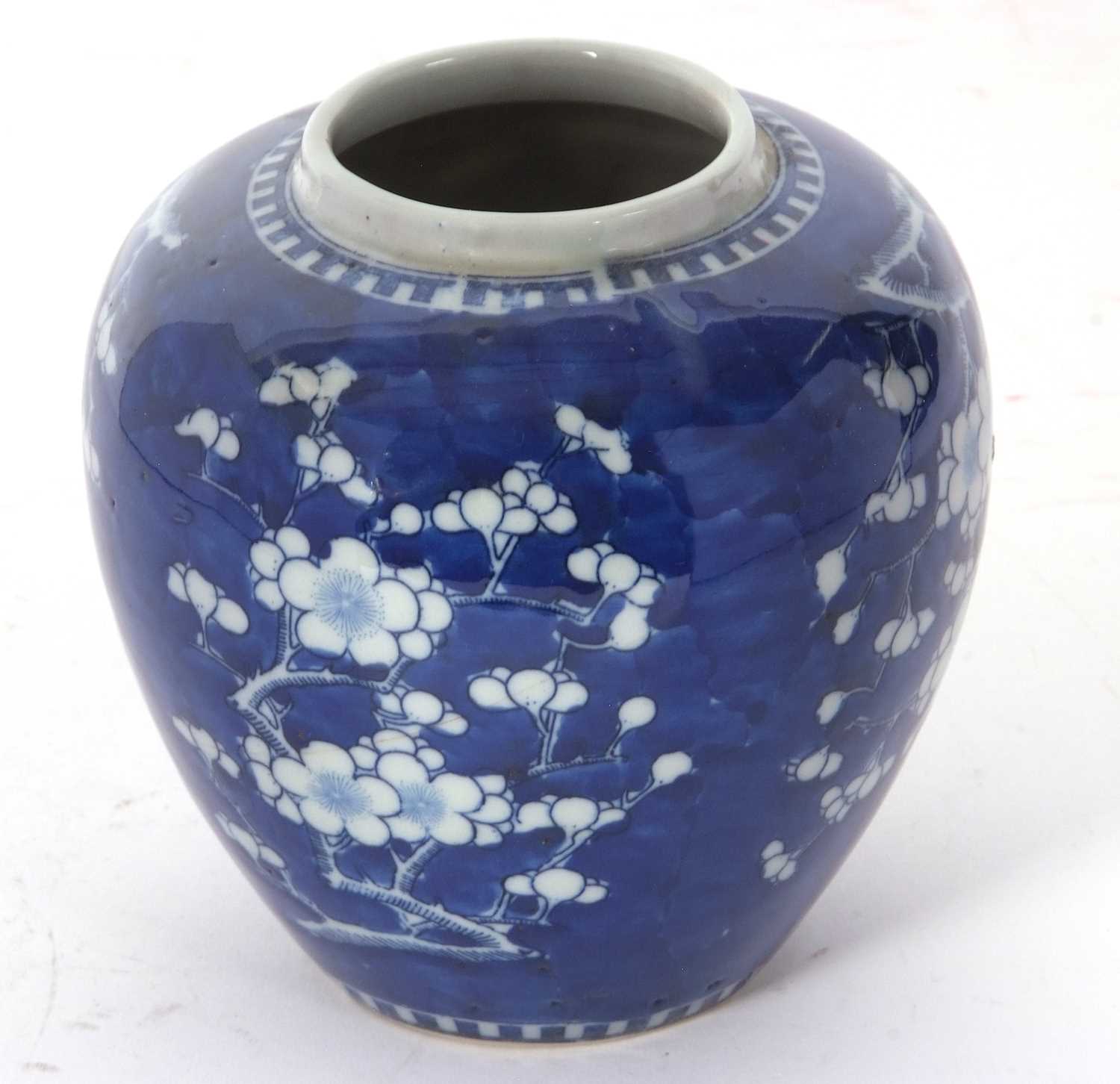 A Chinese porcelain ginger jar 19th Century, the blue ground with prunus decoration, four - Image 3 of 11