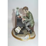 Continental porcelain model of a piano player